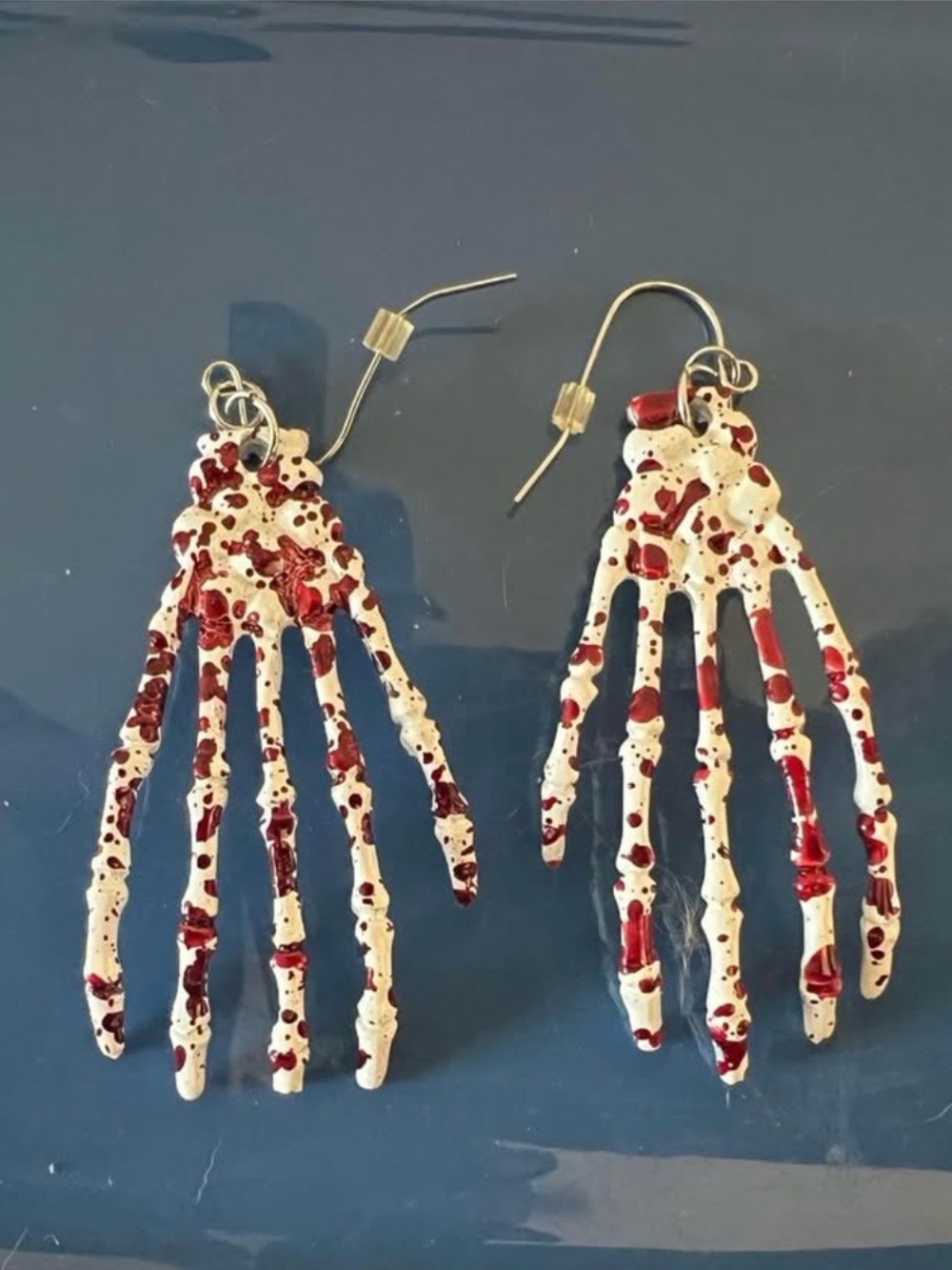 Bloody skeleton hands earrings